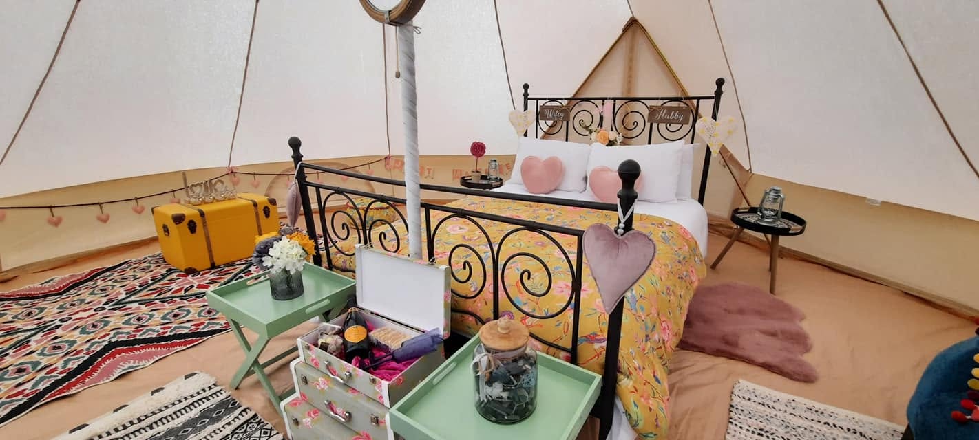 Bell tents at a countryside event