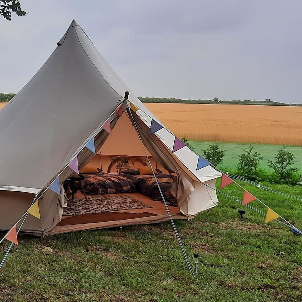 Bell tent prepared for an outdoor event